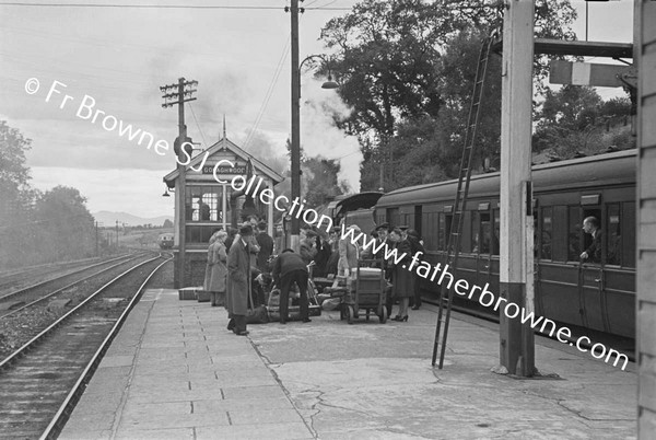 RAILWAY STATION WITH PASSENGERS